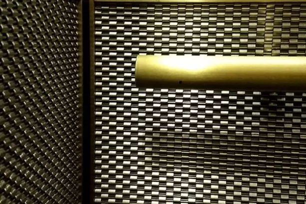 Architectural metal woven mesh used in elevator design
